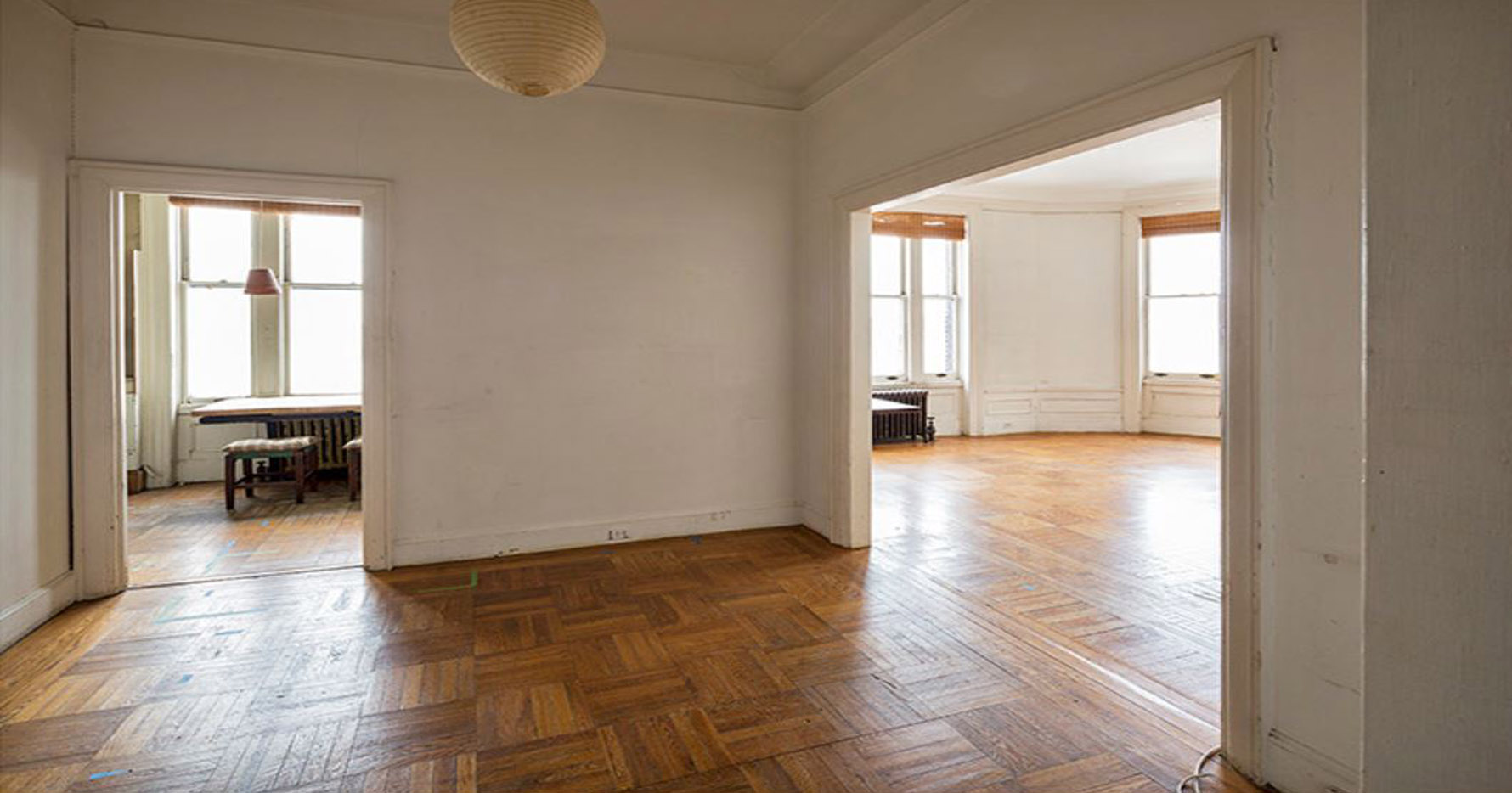 Large windows are visible through the doors of a large vestibule.