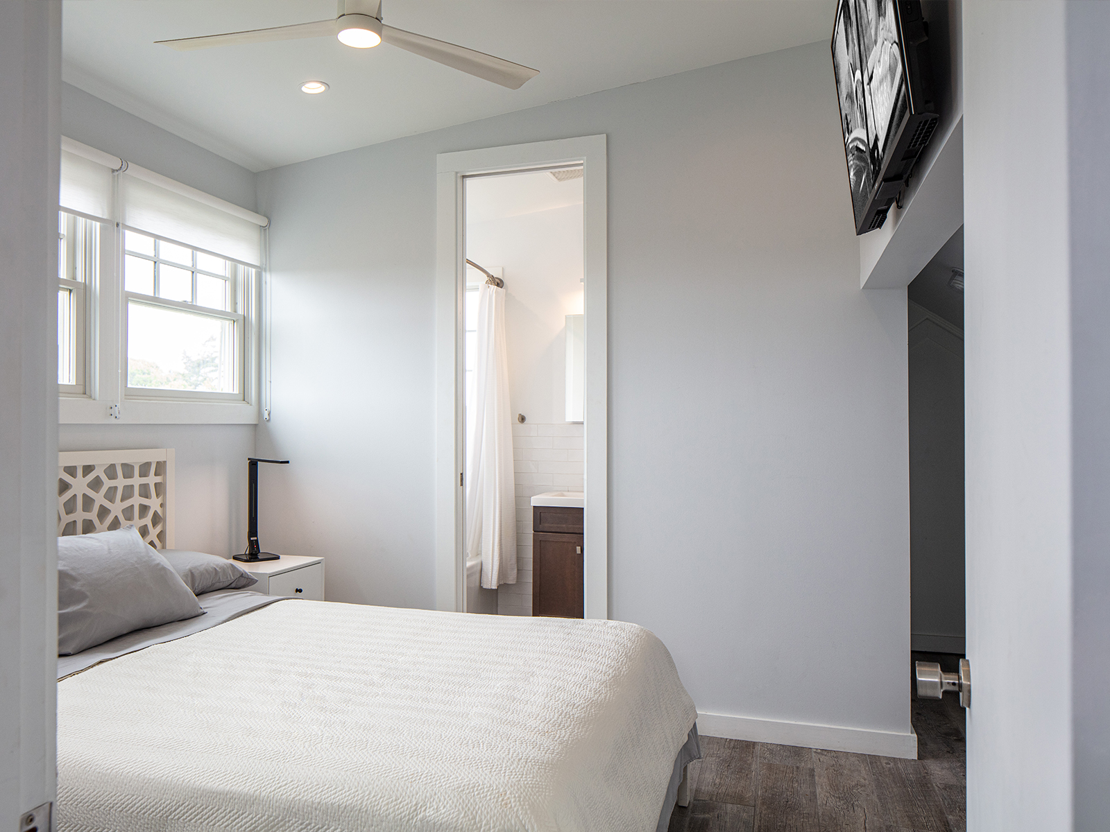 Main Bedroom After Fits a king-size bed, four windows, and an en suite bathroom