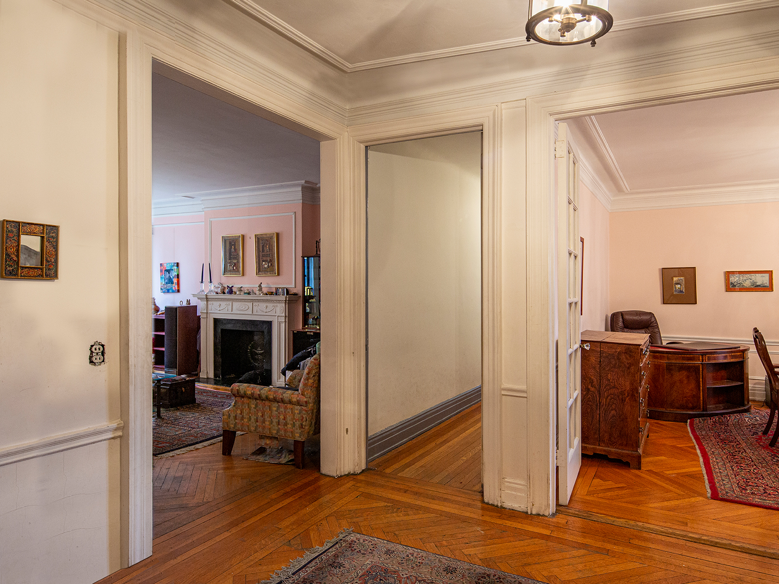 Before: The Living Room is separated from the Dining Room a corridor