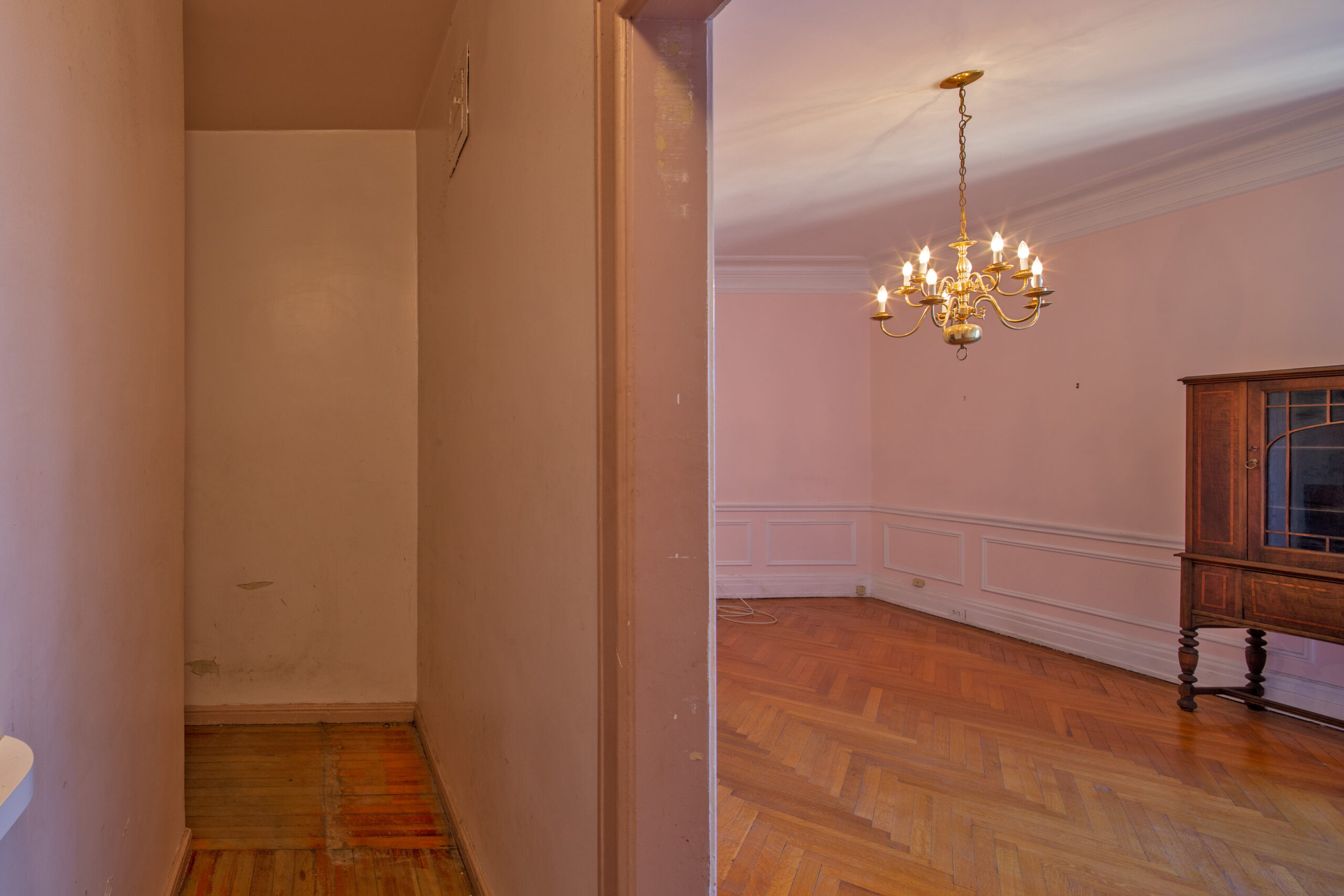 Before: Standing in the service’s corridor, the view of the dining room is a dead-end.