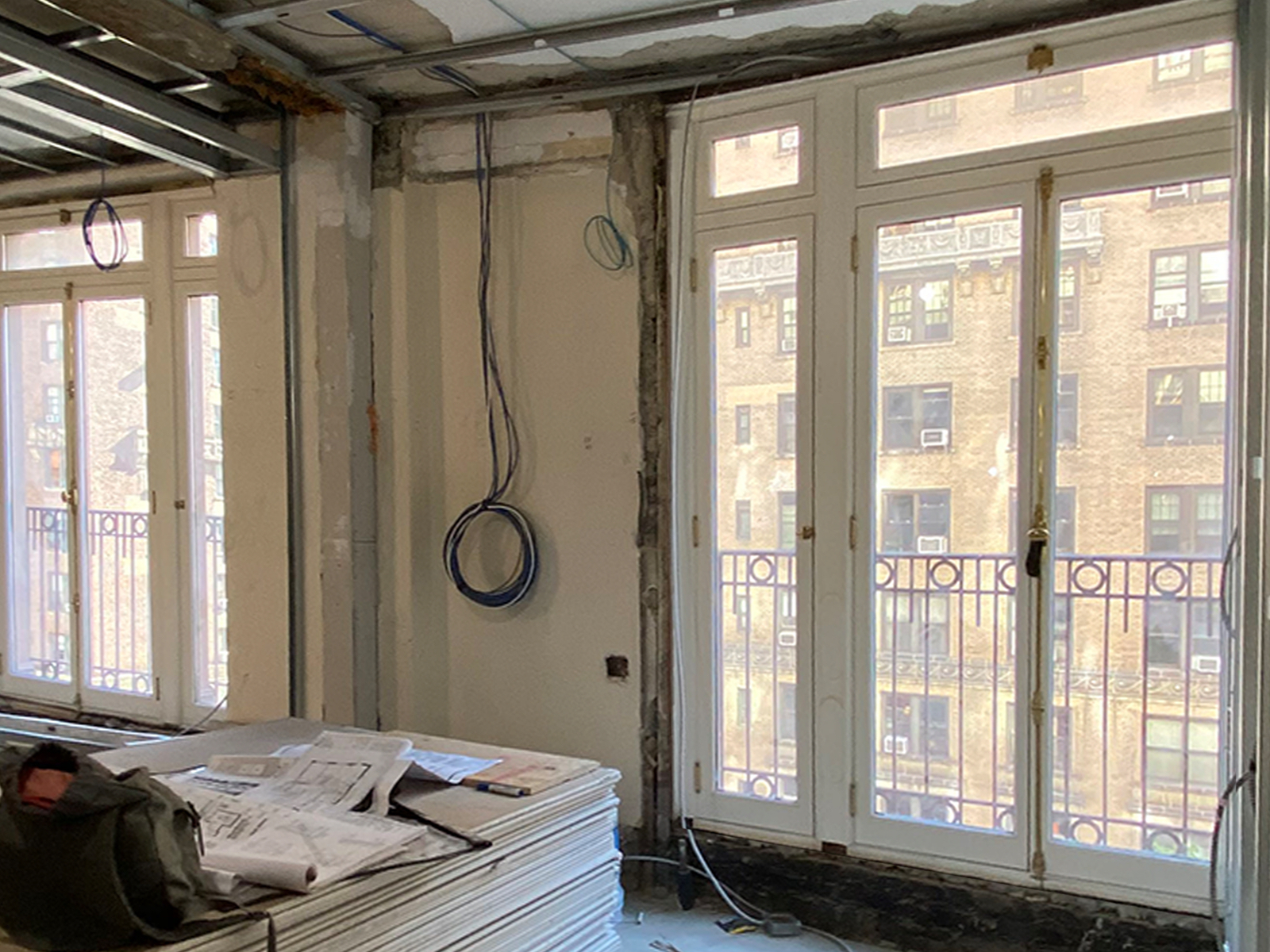 During: With one wall removed, the same window is now part of a wall of windows