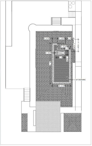 The outline of a home with a deck surrounding it